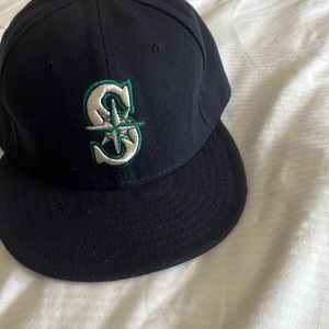 59 Fifty  The official on- field cap of MLB hat . Color dark blue. Size 7 1/4